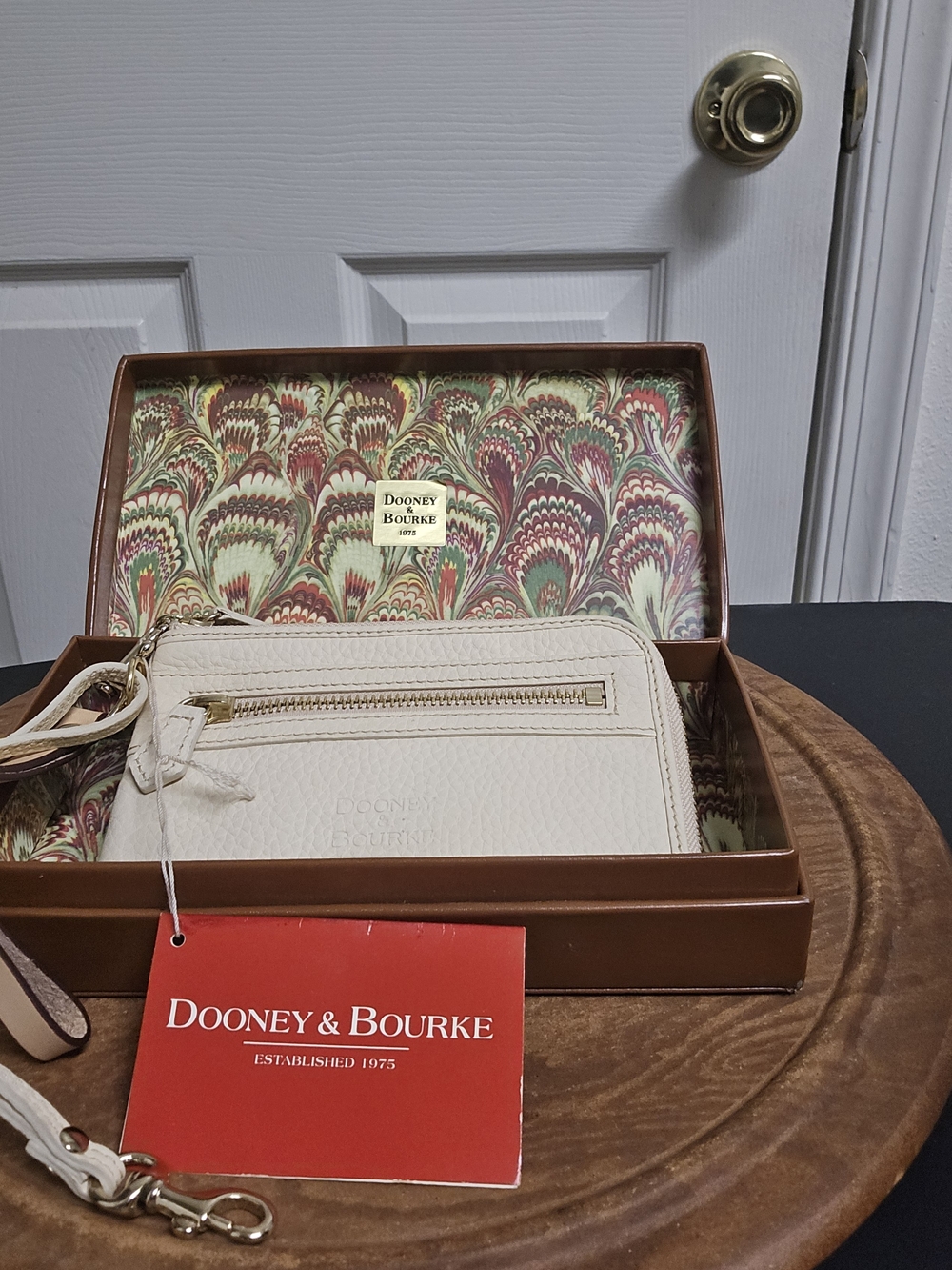 Dooney & Bourke Cream Leather Wristlet Wallet